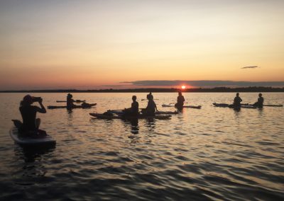 Floating Lotus SUP at sunset